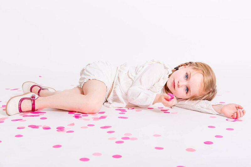 Young Girl Lying on Floor — White, Calm