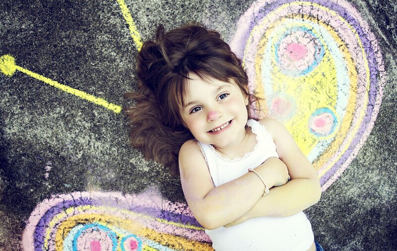 Young Girl Lying on Ground — Yellow