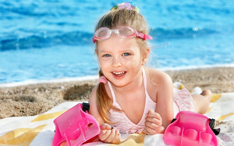 Young Girl on Beach — Blue