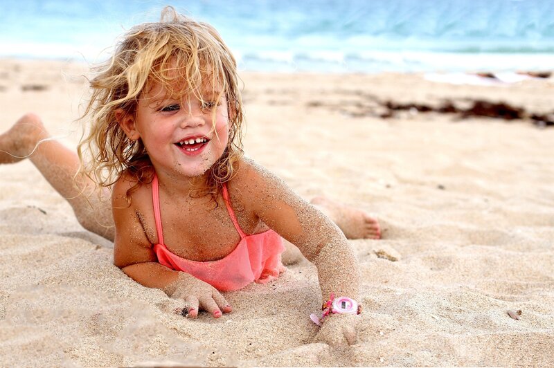 Young Girl on Beach — Pink