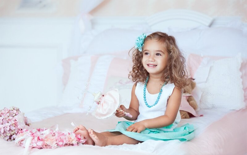 Young Girl on Bed — White, Happy