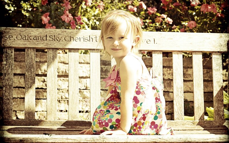 Young Girl on Bench — Pink