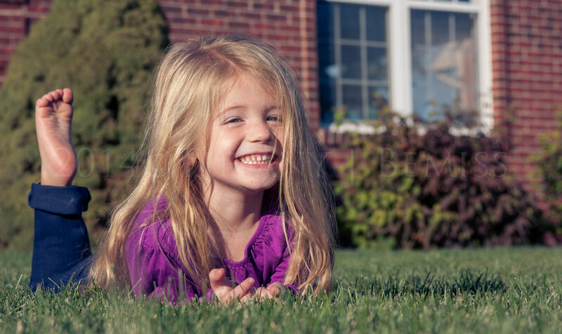 Young Girl on Grass