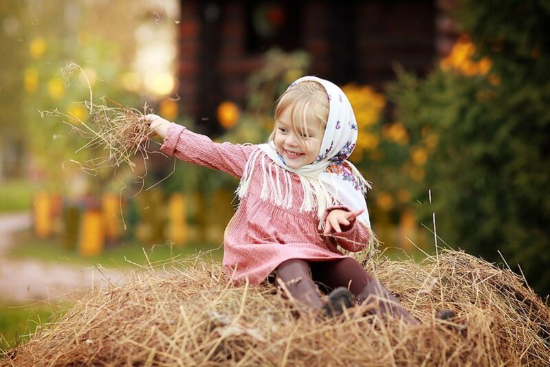 Young Girl on Hay