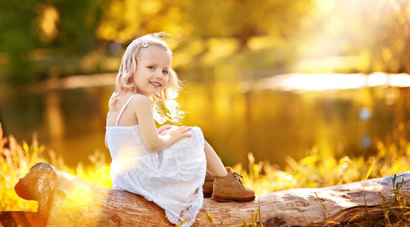 Young Girl on Log — Golden