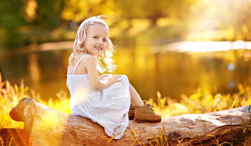 Young Girl on Log — Yellow