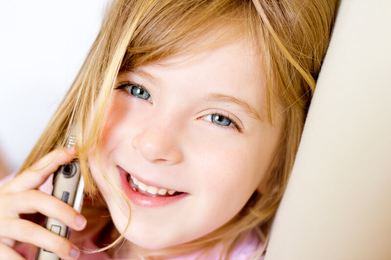 Young Girl on Phone — Blonde
