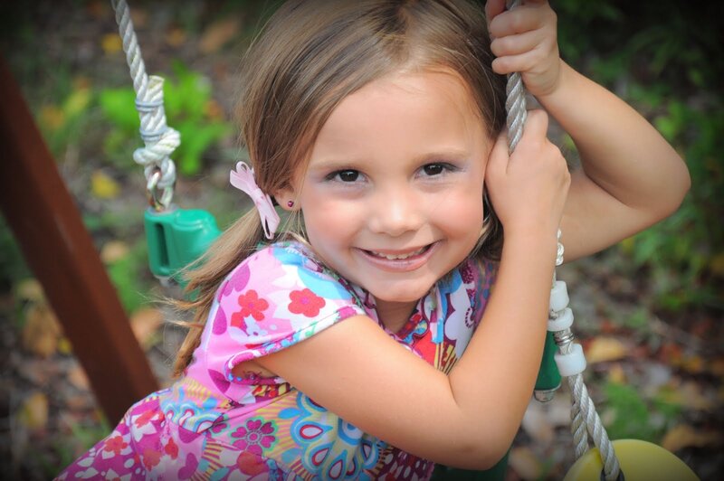 Young Girl on Swing — Pink