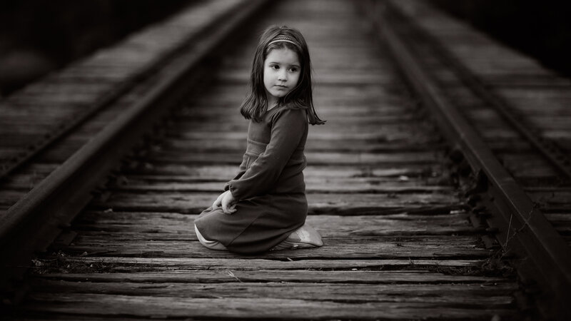 Young Girl on Train Tracks
