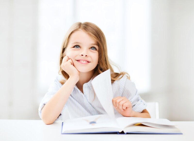 Young Girl Reading Book — White