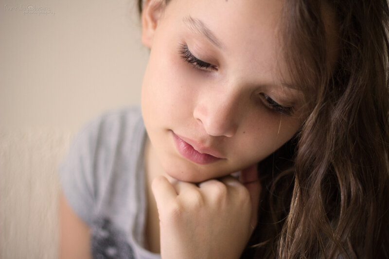 Young Girl Resting Chin