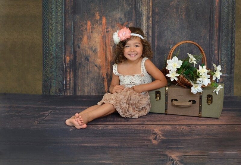 Young Girl Sitting on Floor