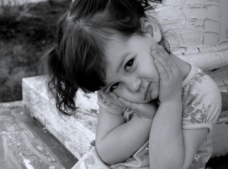 Young Girl Sitting on Steps — Black