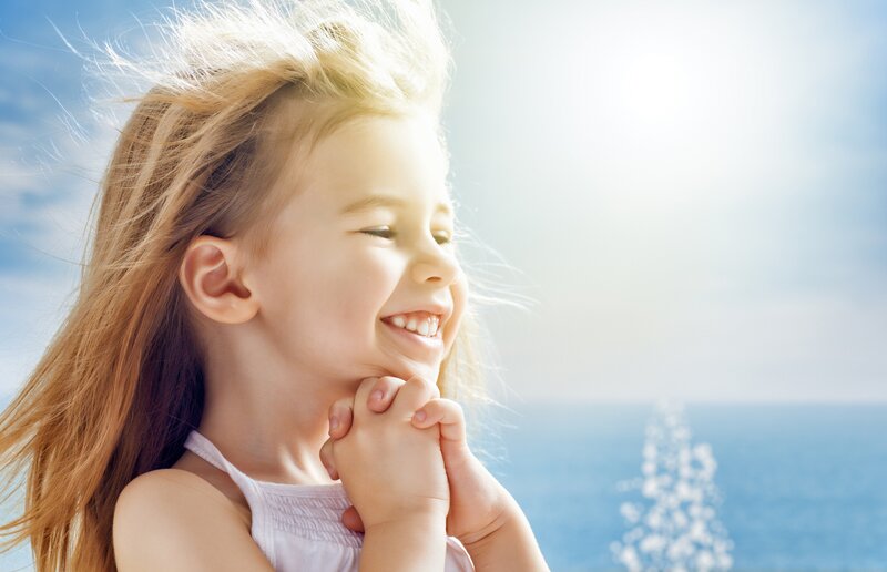 Young Girl Smiling — Blue