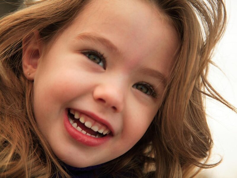 Young Girl Smiling — Brown