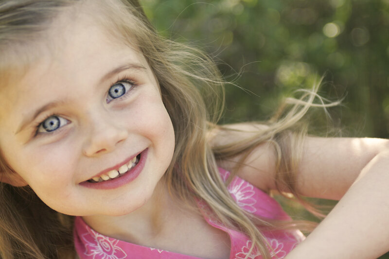 Young Girl Smiling — Pink