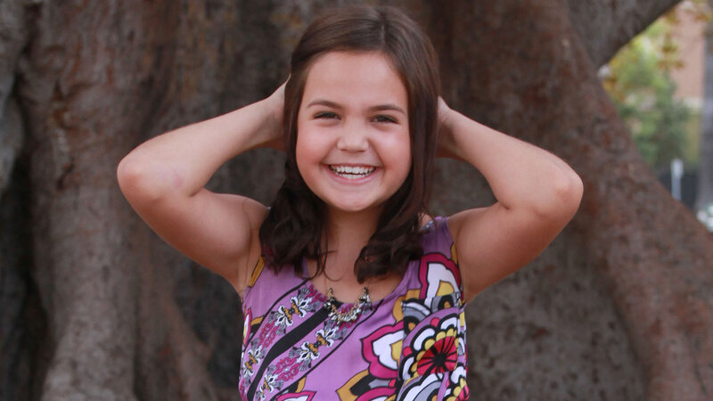 Young Girl Smiling — Purple, Happy