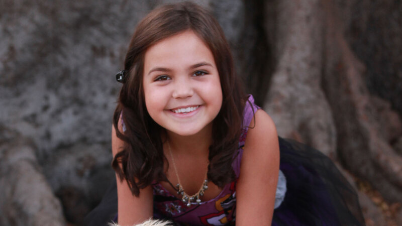 Young Girl Smiling — Purple