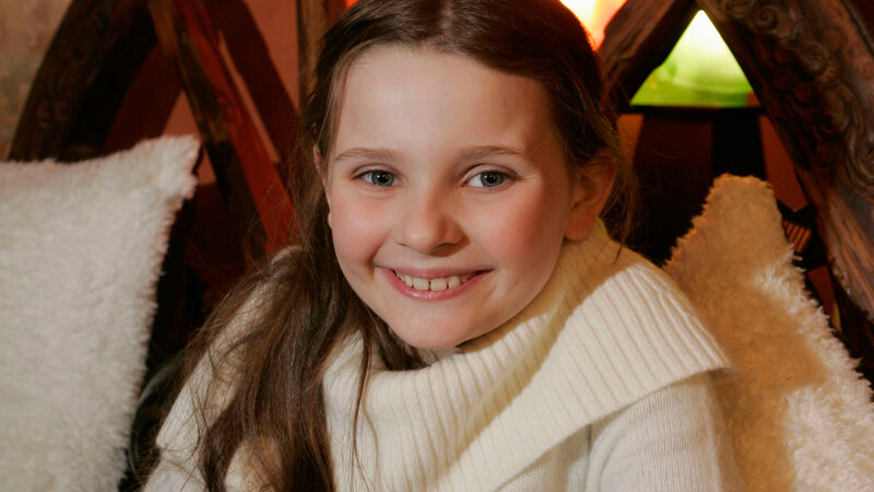 Young Girl Smiling — White