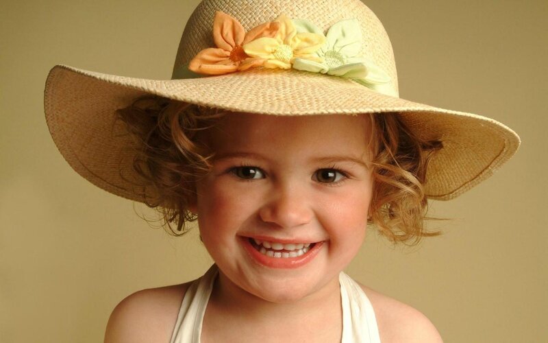 Young Girl Wearing Hat