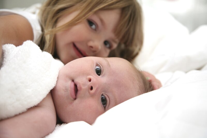 Young Girl with Baby