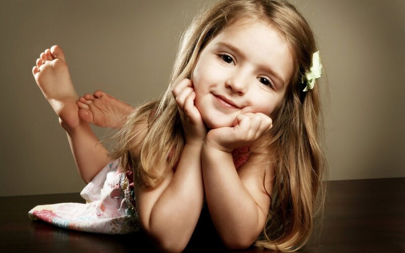 Young Girl with Bare Feet — Brown