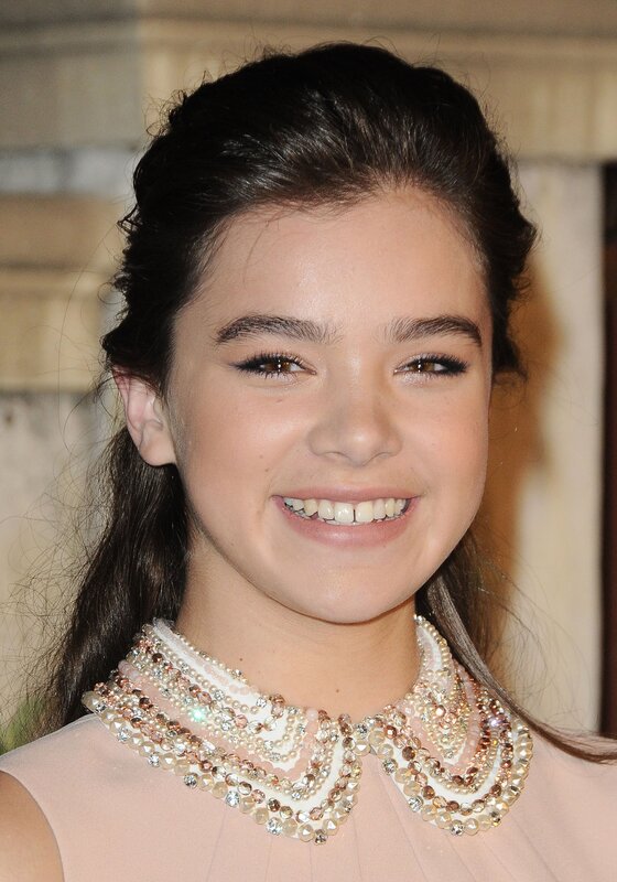 young girl with beaded collar