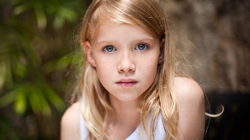 Young Girl with Blonde Hair — Neutral, Photograph, Green Leaves
