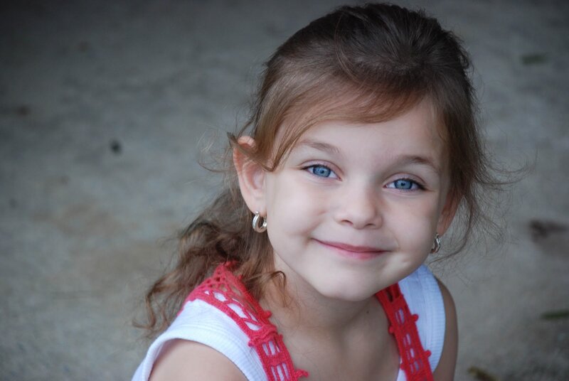 Young Girl with Blue Eyes — Brown, Neutral, Photograph, Earring