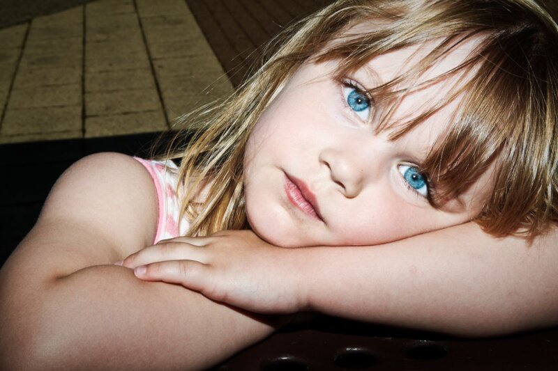 Young Girl with Blue Eyes — Contemplative