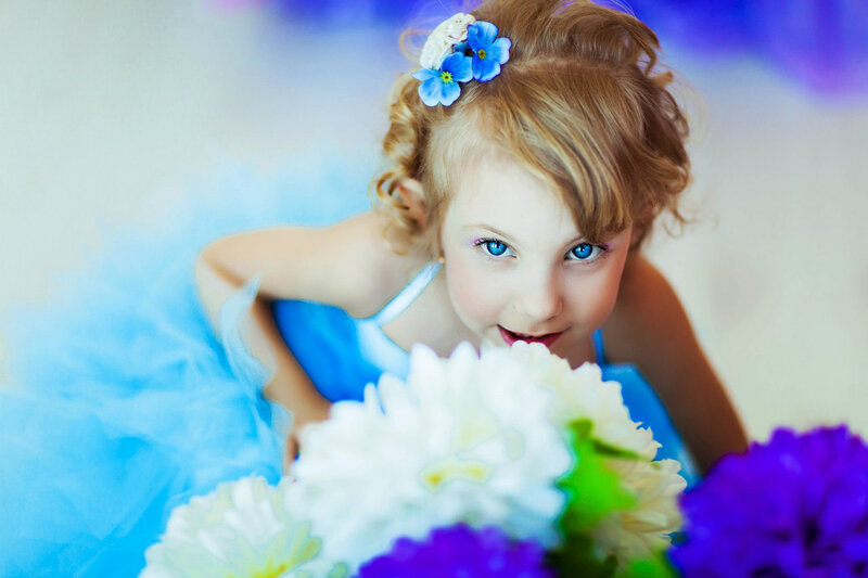 Young Girl with Blue Eyes — Playful