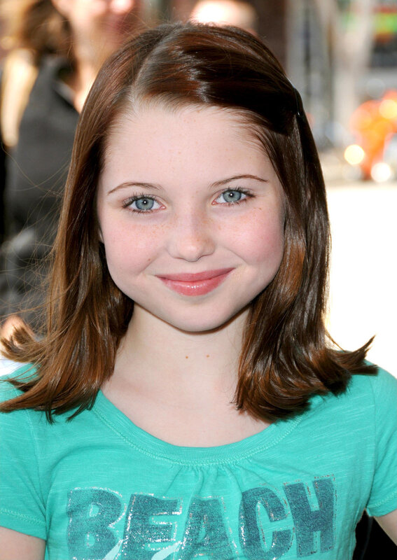 young girl with blue eyes smiling