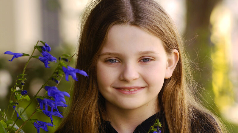 Young Girl with Blue Flowers — Brown