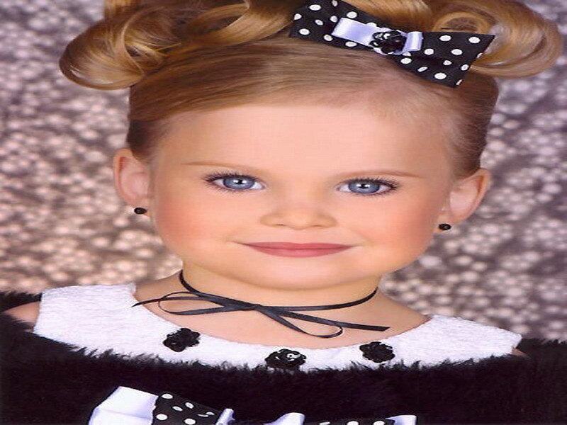 young girl with bow in hair