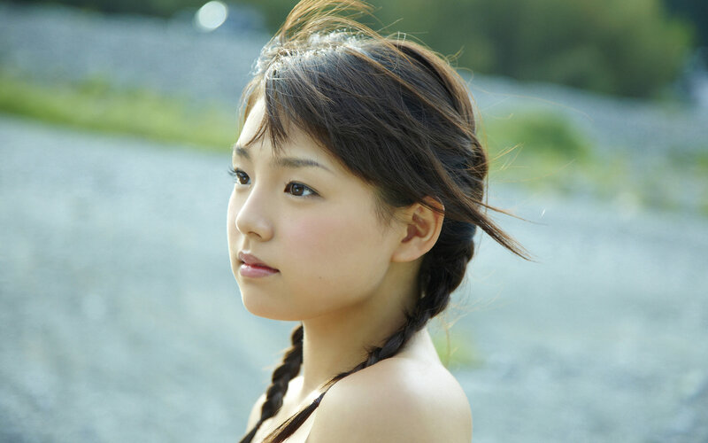 Young Girl with Braided Hair — Brown, Serene, Afternoon
