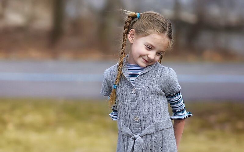 Young Girl with Braids — Gray