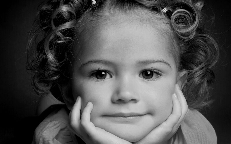 Young Girl with Curly Hair — Black, Calm, Photograph, Hands, Eyes