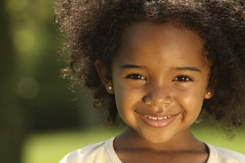 Young Girl with Curly Hair — Brown, Happy, Afternoon
