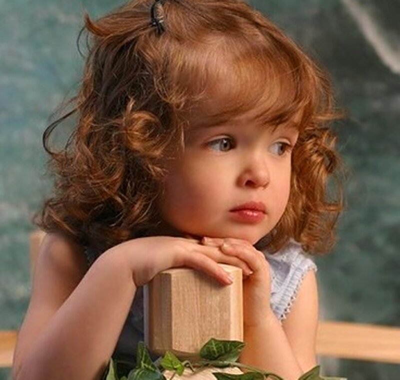 Young Girl with Curly Hair — Brown, Thoughtful