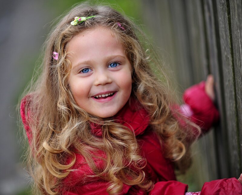 Young Girl with Curly Hair — Red
