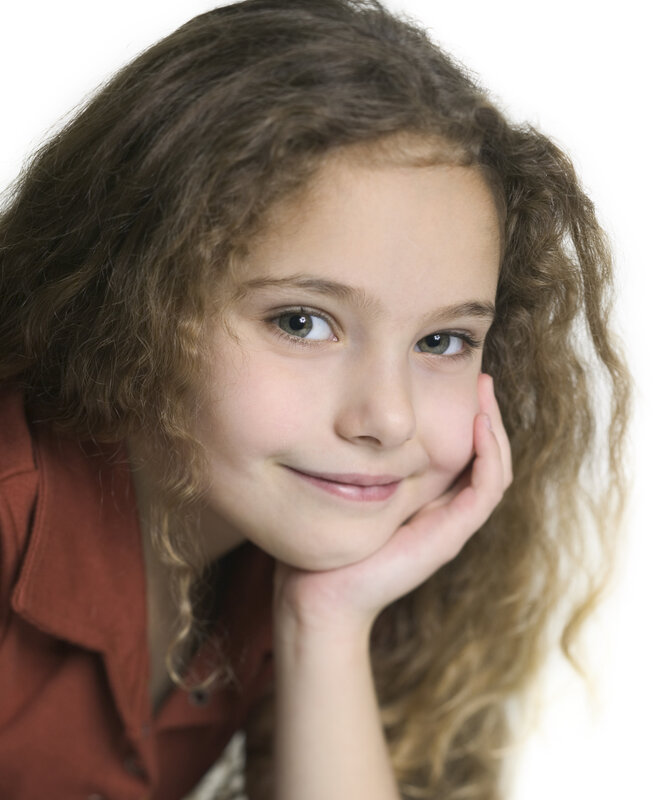 young girl with curly hair