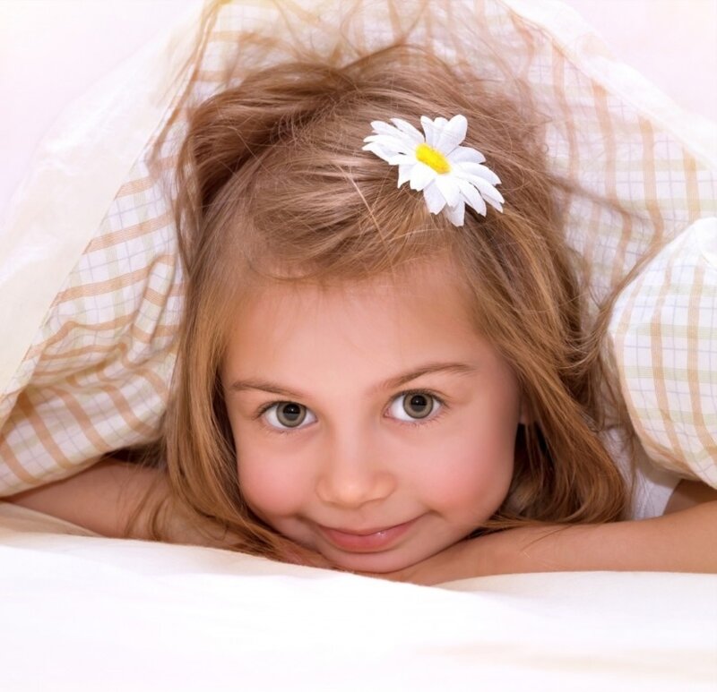 Young Girl with Daisy