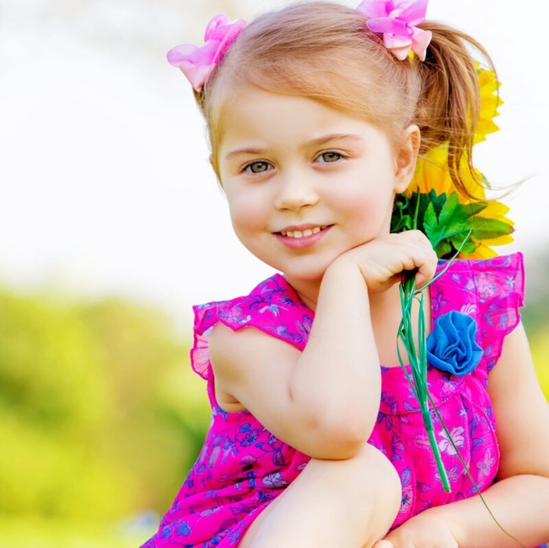 Young Girl with Flowers — Pink