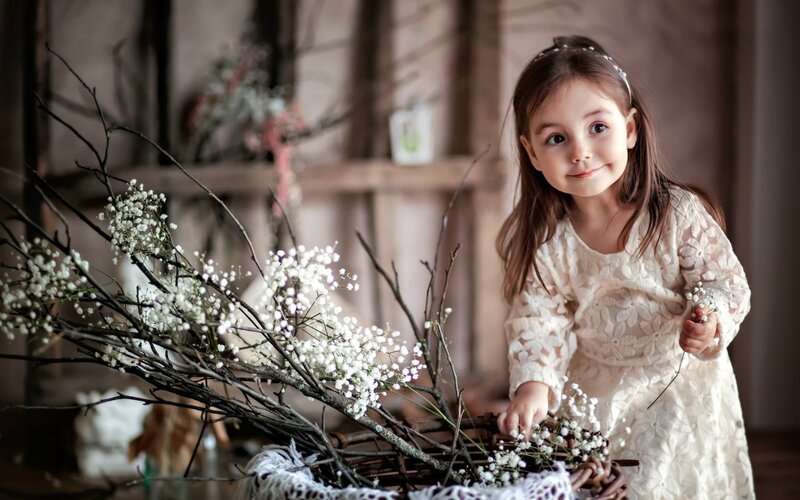Young Girl with Flowers — White, Serene, Photograph, Basket