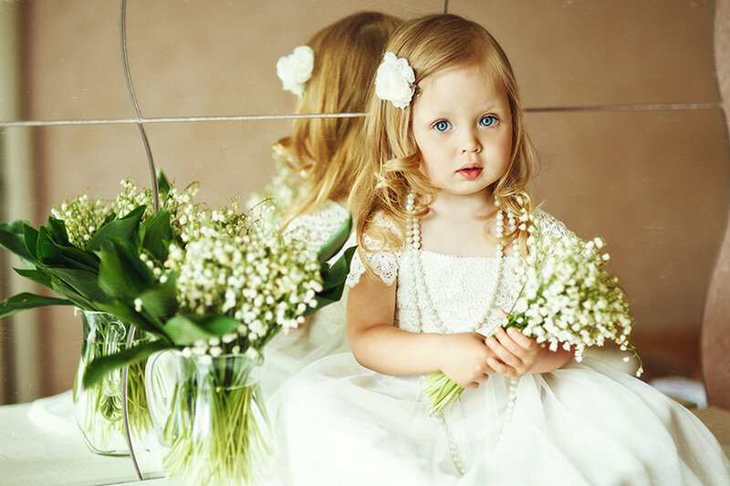 Young Girl with Flowers — White, Serene, Photograph