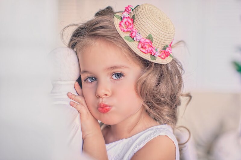 Young Girl with Hat — White, Playful