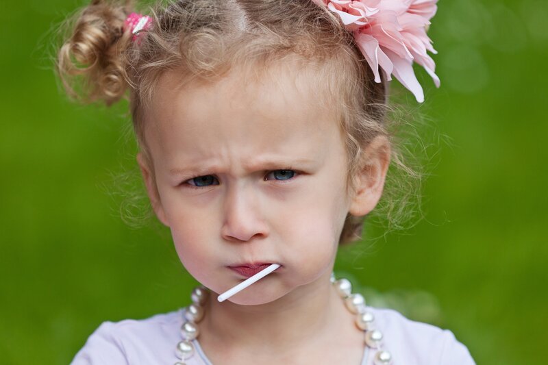 Young Girl with Lollipop
