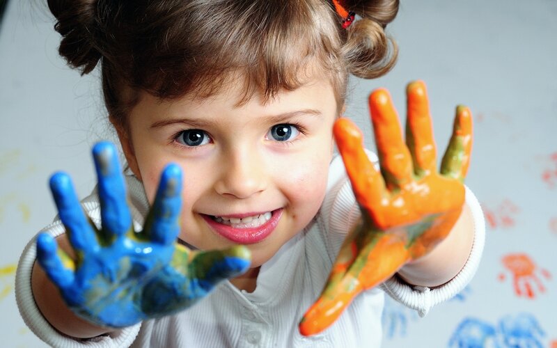 Young Girl with Painted Hands