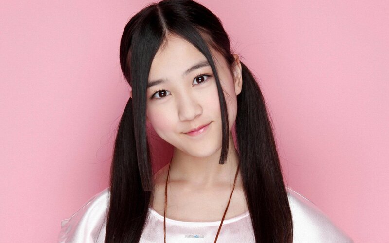 young girl with pigtails