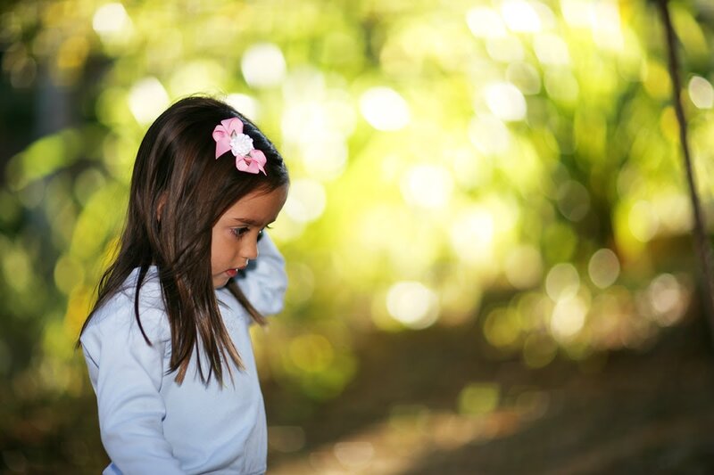 Young Girl with Pink Bow